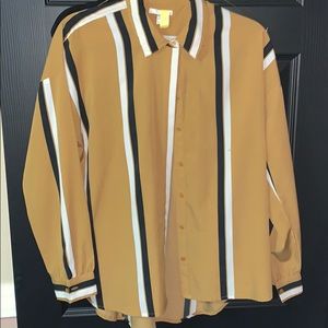 Blouse with stupid gold black and white